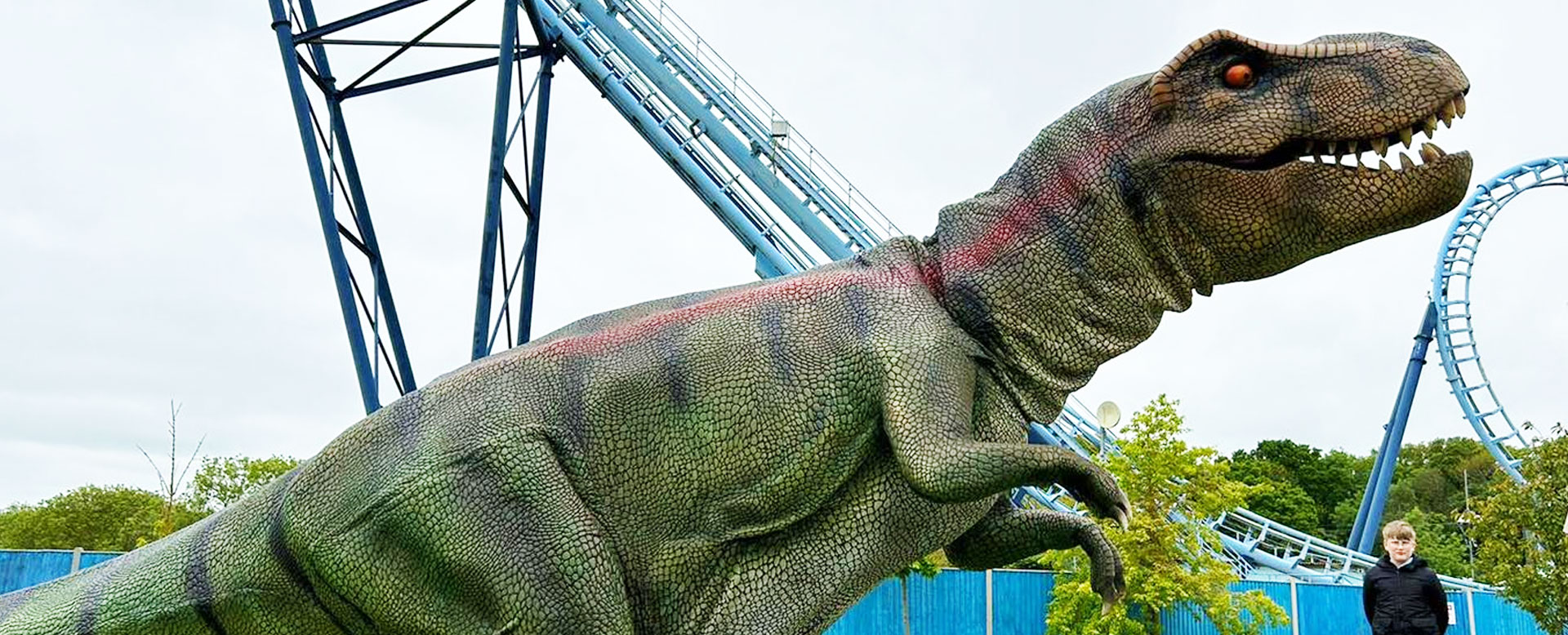 T-Rex dinosaur near Wipeout rollercoaster Pleasurewood Hills theme park