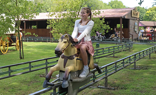 Young girl on amusement ride