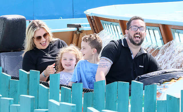Family on a log flume ride