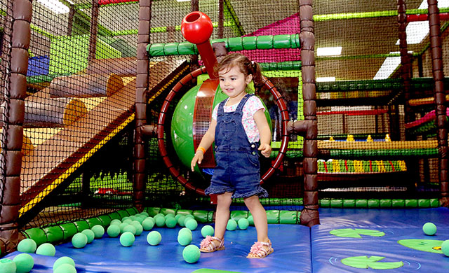Young girl in a soft play area